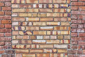 Brick Wall Background Image Imprime: Old brick wall background texture with a window covered by different bricks