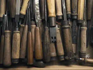 Handmade Goods Imprime: Old used chisel in a workbench drawer