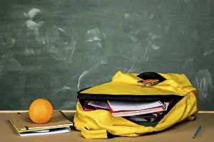 Educational Institution Equipment Imprime: Open backpack orange table