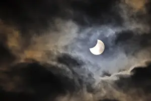 Cloudy Sky Europe Imprime: Partial solar eclipse, thin cloud cover