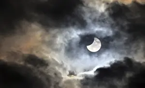 Solar Eclipse Germany Imprime: Partial solar eclipse, thin cloud cover