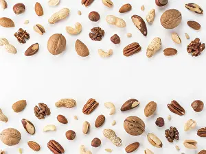 Isolated Nuts Imprime: Pattern of nuts mix with copy space