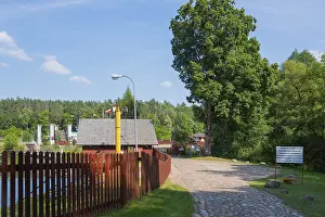 Urban Environment Eastern Europe Imprime: Paved path with trees and view of the lock