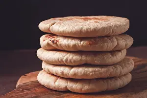 Bakery Products On Table Imprime: Pita bread, stack, on the table, no people