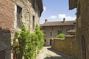 Uninhabited Medieval Fortress Imprime: Cobblestone street, medieval walled town of Perouges