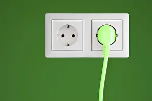 Renewable Energy Symbol Imprime: Power socket with a green plug