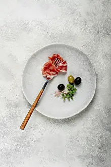 Italian Delicacy Imprime: Prosciutto on a fork, top view