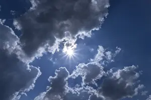 Germany Cloudy Sky Imprime: Rain clouds with sun in backlight