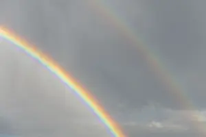 Springtime Alsace France Imprime: Rainbow appears in rain clouds in spring