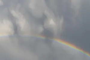 Springtime Alsace France Imprime: Rainbow appears in rain clouds in spring