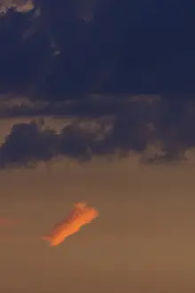 German Rain Clouds Imprime: Reddish small cloud in evening light