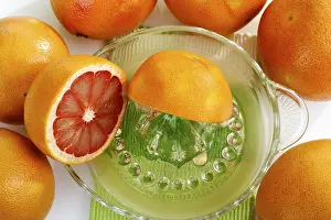 Studio Fruit Photography Imprime: Ruby grapefruit with citrus press