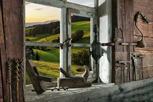 Black Forest Landscape Photography Imprime: Rustic workshop with old tools and view out of the window into the landscape