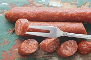 Meat Products Images Imprime: Salami with a fork