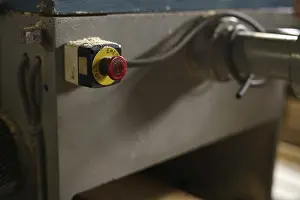 Industrial Building Architecture Imprime: At sawmill. Image of stop button on machine