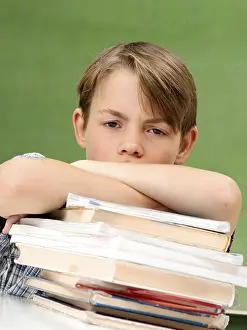 Schoolboy With Books Imprime: Schoolboy with a stack of books
