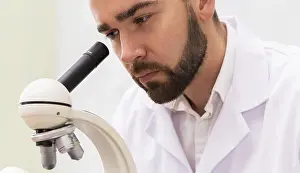 One Person Lab Imprime: Scientist is using microscope in a laboratory during research work