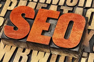 Vintage Letterpress Typography Imprime: SEO (search engine optimization) acronym - word abstract in vintage letterpress wood type stained by red ink