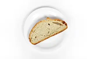 High Angle View Plate Imprime: A slice of bread on a plate