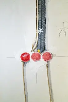 New Construction Site Imprime: Three sockets built into the wall