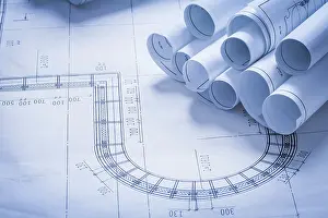 Blueprint Rolls Concept Imprime: Stack of blueprint rolls construction concept