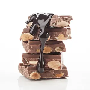 Gourmet Snacks Imprime: A stack of chocolate bars with almonds