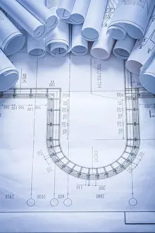 Engineering Blueprint Imprime: Stack of construction drawings maintenance concept