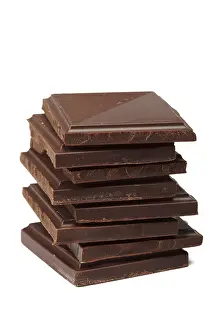 Dark Chocolate Imprime: Stack of dark chocolate isolated on white