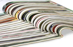 Bright White Background Cutout Imprime: Stack of magazines isolated on white background