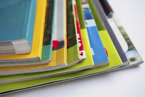 Magazine Stack Imprime: Stack of magazines on white background