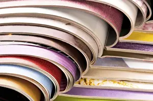 Environmental Conservation Through Reuse Imprime: Stack of open magazines