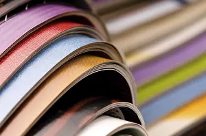 Waste Separation Techniques Imprime: Stack of open magazines