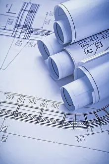 Rolled Up Papers Imprime: Stack of rolls blueprints close up