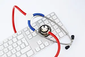 Austria Healthcare System Imprime: Stethoscope and keyboard of a computer