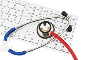 Healthcare Concept Picture Imprime: Stethoscope and keyboard of a computer