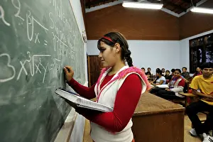 Youth Education Imprime: Student solving a math equation