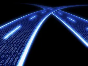 Data Transmission Imprime: Stylized glowing blue highway with binary code