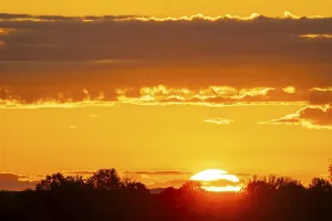 Cloudy Skies Central Europe Imprime: Sunrise, sky and clouds orange, Thuringia, Germany