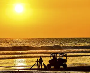 Coastal Evening Light Imprime: Sunset on beach