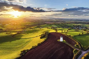 Windmill Landscape Photo Imprime: Sunset of Devon Windmill over Fields and Farms from a drone