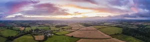 Remote Controlled Aircrafts Imprime: Sunset over the fields from a drone