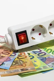 Electricity Costs Imprime: Switchable socket strip, euro banknotes