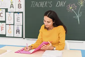 Classroom Learning Imprime: Teacher taking notes class