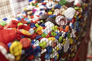 Urban Waste Management Imprime: A vibrant array of plastic caps