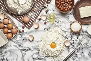 Marble Table Background Imprime: Top view of a kitchenware and baking ingredients on a marble table background