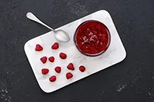 Homemade Jam Recipe Imprime: Top view of transparent pot with raspberry jam