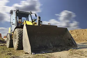 Construction Site Germany Imprime: Wheel loader at sunset, here in the RingstraBe development area (Mutterstadt)