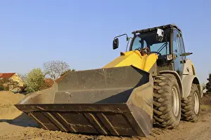 Construction Site Germany Imprime: Wheel loader at sunset, here in the RingstraBe development area (Mutterstadt)