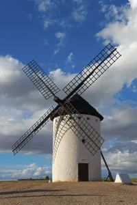 Wind Wheel Europe Imprime: A windmill in front of an impressive sky full of clouds