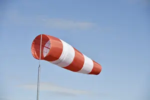 Windy Day In Germany Imprime: Windsack, flag, wind direction sensor, Germany